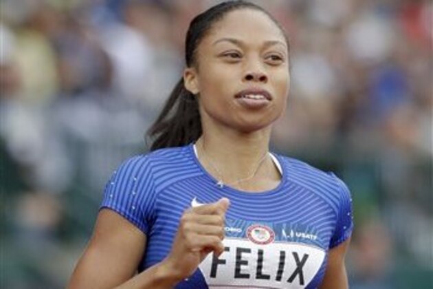Allyson Felix wins her heat during qualifying for women's 200-meter run at the U.S. Olympic Track and Field Trials, Friday, July 8, 2016, in Eugene Ore. (AP Photo/Marcio Jose Sanchez)