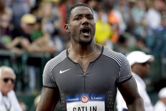 Justin Gatlin celebrates his win in the men's 200-meter run at the U.S. Olympic Track and Field Trials, Saturday, July 9, 2016, in Eugene Ore. (AP Photo/Marcio Jose Sanchez)
