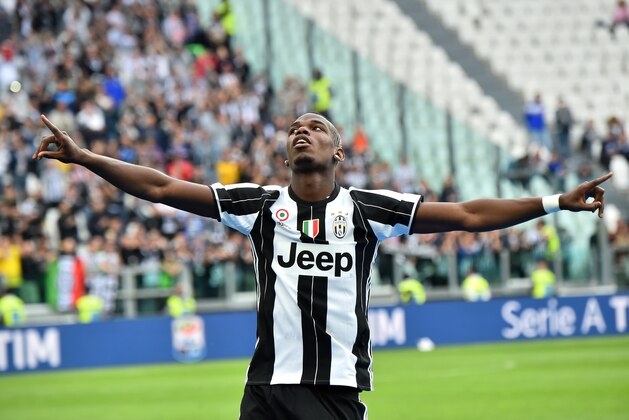 Juventus' midfielder Paul Pogba from France celebrates after the Italian Serie A football match Juventus vs Sampdoria on May 14, 2016 at the 'Juventus Stadium' in Turin. Juventus celebrate a record-equalling fifth consecutive Serie A title. / AFP / GIUSEPPE CACACE        (Photo credit should read GIUSEPPE CACACE/AFP/Getty Images)