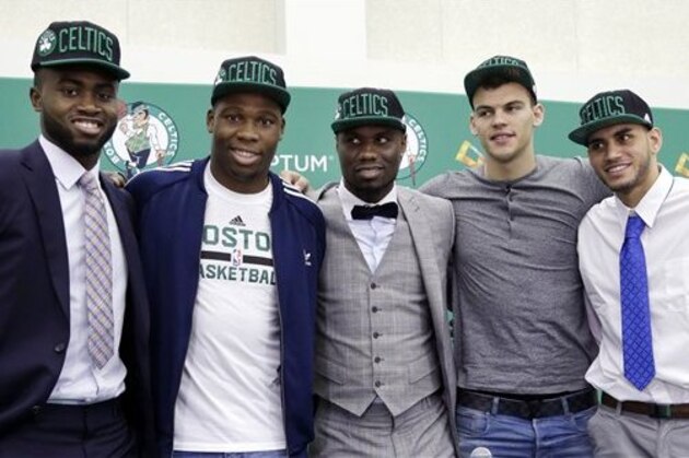 Boston Celtics basketball draft picks for 2016 pose from left, Jaylen Brown, Guerschon Yabusele, Ben Bentil, Ante Zizic and Abdel Nader, after they were introduced to media Friday, June 24, 2016, in Waltham, Mass. (AP Photo/Elise Amendola)