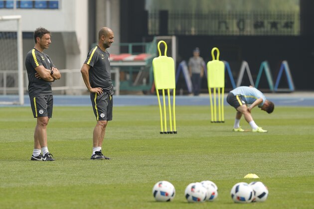 BEIJING, CHINA - JULY 24:  Manchester City's manager Pep Guardiola attends the pre-game training ahead of the 2016 International Champions Cup match between Manchester City and Manchester United at Olympic Sports Center Stadium on July 24, 2016 in Beijing, China.  (Photo by Lintao Zhang/Getty Images)