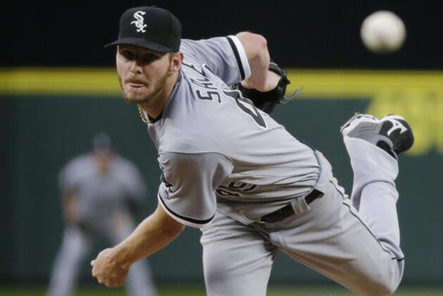 FILE - In this Monday, July 18, 2016, file photo, Chicago White Sox starting pitcher Chris Sale throws to a Seattle Mariners batter during a baseball game in Seattle. Sale has been scratched from his start against the Detroit Tigers after he was involved in what the team says was a