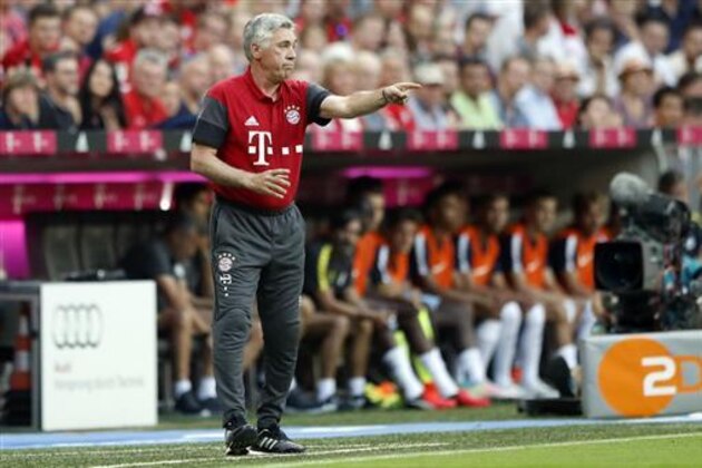 Bayern coach Carlo Ancelotti gestures during a friendly soccer match between FC Bayern Munich and Manchester City at the Allianz Arena stadium in Munich, Germany, Wednesday, July 20, 2016. (AP Photo/Matthias Schrader)