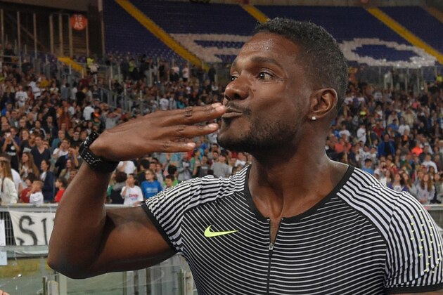 US Justin Gatlin celebrates after winning the Men's 100m event at the Rome's Diamond League competition on June 2, 2016 at the Olympic Stadium in Rome.   AFP PHOTO / TIZIANA FABI AFP PHOTO / ANDREAS SOLARO / AFP / ANDREAS SOLARO        (Photo credit should read ANDREAS SOLARO/AFP/Getty Images)