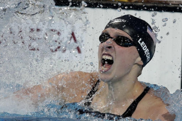 FILE - In this Aug. 8, 2015, file photo, Katie Ledecky, of the United States, celebrates after winning the women's 800m freestyle final at the Swimming World Championships in Kazan, Russia. Ledecky has gone from a surprise gold medalist in London to one of the world’s most dominant swimmers at age 19. (AP Photo/Michael Sohn, File)