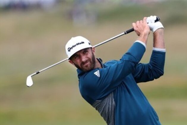 Dustin Johnson of the United States plays a shot from the 4th fairway during a practice round ahead of the British Open Golf Championship at the Royal Troon Golf Club in Troon, Scotland, Wednesday, July 13, 2016. The British Open starts Thursday.(AP Photo/Peter Morrison)