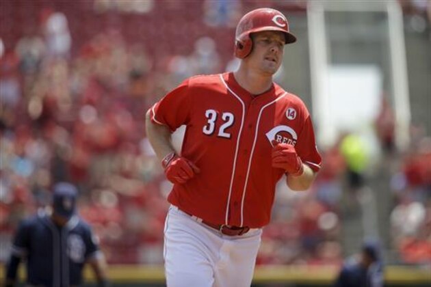 Cincinnati Reds' Jay Bruce runs the bases after hitting a solo home run off San Diego Padres relief pitcher Luis Perdomo in the fourth inning of a baseball game, Sunday, June 26, 2016, in Cincinnati. (AP Photo/John Minchillo)