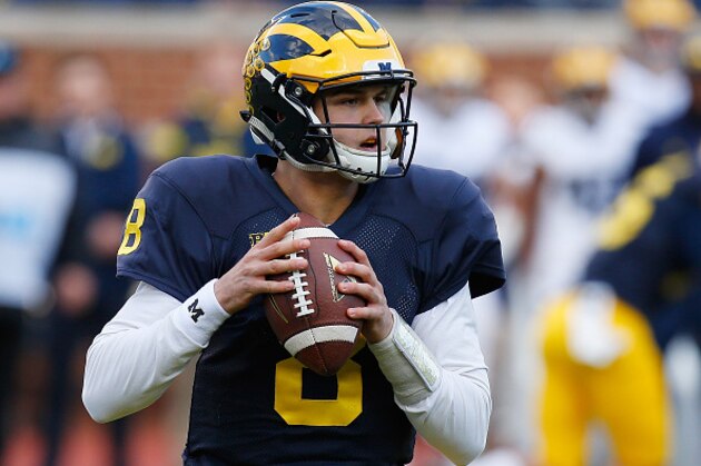 ANN ARBOR, MI - APRIL 01: John O'Korn #8 of the Michigan Wolverines throws a pass during the Michigan football spring game on April 1, 2016 at Michigan Stadium in Ann Arbor, Michigan.  (Photo by Gregory Shamus/Getty Images)