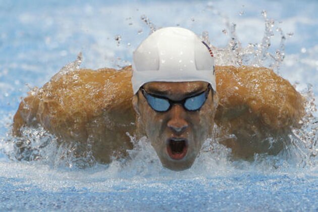 FILE - In this July 28, 2012, file photo, Michael Phelps competes in a heat of the men's 400-meter individual medley at the 2012 Summer Olympics in London. After retiring and then un-retiring, Phelps will be in Rio as the first U.S. male swimmer to compete in five Olympics. (AP Photo/Michael Sohn, File)