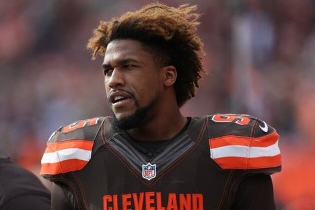 FILE - In this Dec. 6, 2015, file photo, Cleveland Browns' Armonty Bryant (95) watches during the first half of an NFL football game against the Cincinnati Bengals in Cleveland. Bryant has been indicted on two felony drug charges. Bryant and former teammate De'Ante Saunders were arrested on Christmas following a traffic stop. Police say they found marijuana, prescription drugs and a loaded handgun in Saunders' car. Bryant was suspended for Cleveland's final two games but remains on the Browns' roster. Saunders was released from their practice squad. (AP Photo/Ron Schwane, File)