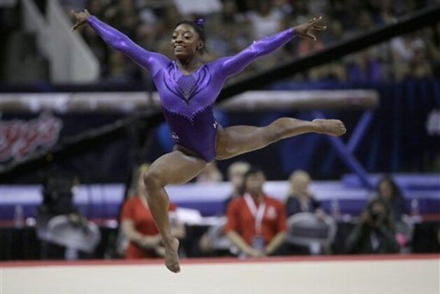 Simone Biles competes on the floor exercise during the women's U.S. Olympic gymnastics trials in San Jose, Calif., Friday, July 8, 2016. (AP Photo/Ben Margot)