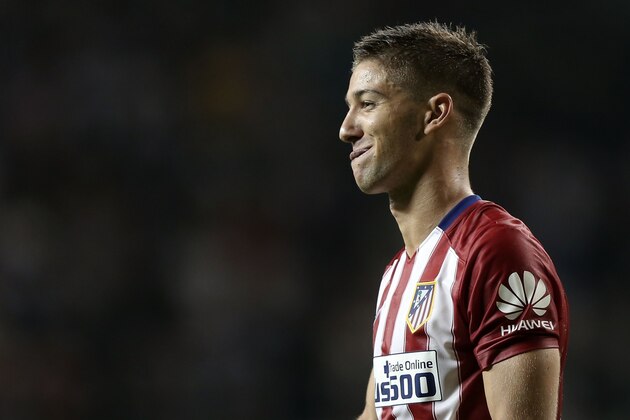 TOSU, JAPAN - AUGUST 01: Luciano Vietto #23 of Atletico Madrid reacts after kicking the winning goal during  a penalty shoot out against Sagan Tosu F.C. during the friendly match between Atletico Madrid and Sagan Tosu F.C. at Tosu Stadium on August 1, 2015 in Tosu, Japan.  (Photo by Chris McGrath/Getty Images)