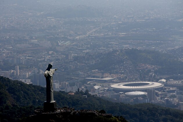 RIO DE JANEIRO, BRAZIL - JULY 04:  Aerial view of Christ the Redeemer with Maracana Stadium in the background  in preparation for the 2016 Olympic Games on July 4, 2016 in Rio de Janeiro, Brazil.  (Photo by Matthew Stockman/Getty Images)