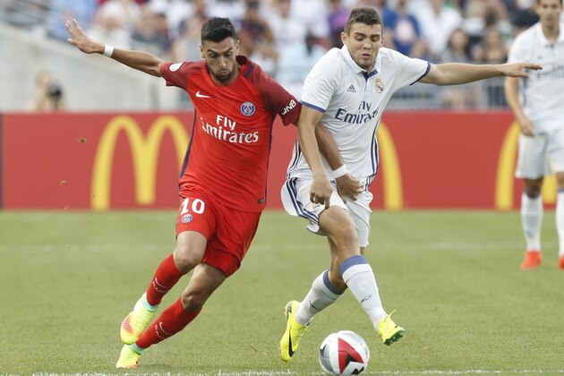 Paris Saint-Germain Javier Pastore (L) and Real Madrid midfielder Mateo Kovacic (R) chase a loose ball during an International Champions Cup soccer match in Columbus, Ohio on July 27, 2016. / AFP / Jay LaPrete        (Photo credit should read JAY LAPRETE/AFP/Getty Images)