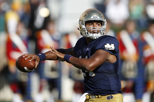 SOUTH BEND, IN - SEPTEMBER 19: DeShone Kizer #14 of the Notre Dame Fighting Irish passes against the Georgia Tech Yellow Jackets during the game at Notre Dame Stadium on September 19, 2015 in South Bend, Indiana. Notre Dame defeated Georgia Tech 30-22. (Photo by Joe Robbins/Getty Images)