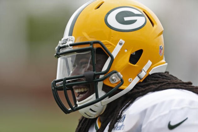 Green Bay Packers running back Eddie Lacy jokes around with teammates during NFL football training camp, Thursday, July 28, 2016, in Green Bay, Wis. (AP Photo/Matt Ludtke)