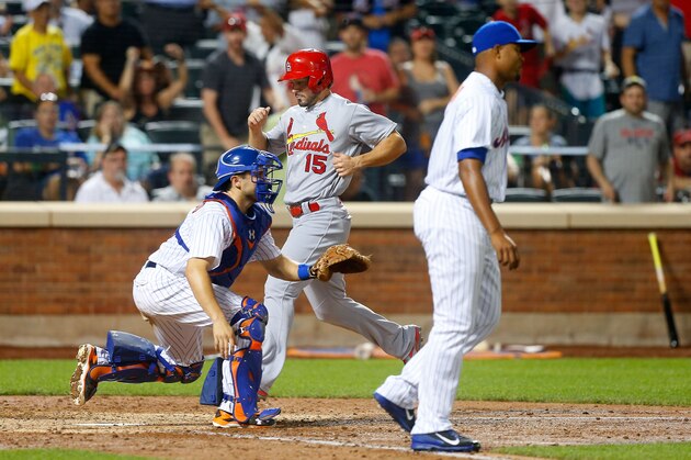 NEW YORK, NY - JULY 27:  Pinch runner Randal Grichuk #15 of the St. Louis Cardinals scores the game tying ninth inning run between Travis d'Arnaud #18 and Jeurys Familia #27 of the New York Mets at Citi Field on July 27, 2016 in the Flushing neighborhood of the Queens borough of New York City.  (Photo by Jim McIsaac/Getty Images)