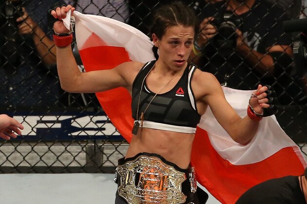 LAS VEGAS, NV - JULY 08:  Joanna Jedrzejczyk of Poland celebrates after the conclusion of her UFC women's strawweight championship bout against Claudia Gadelha during The Ultimate Fighter Finale event at MGM Grand Garden Arena on July 8, 2016 in Las Vegas, Nevada.  (Photo by Ed Mulholland/Zuffa LLC/Zuffa LLC via Getty Images)