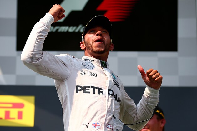 BUDAPEST, HUNGARY - JULY 24:  Lewis Hamilton of Greatc Britain and Mercedes GP celebrates on the podium after winning the Formula One Grand Prix of Hungary at Hungaroring on July 24, 2016 in Budapest, Hungary.  (Photo by Dan Istitene/Getty Images)