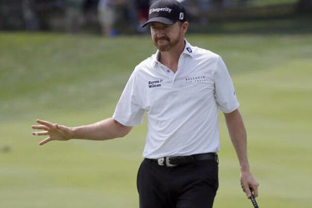 Jimmy Walker reacts to his putt on the third hole during the first round of the PGA Championship golf tournament at Baltusrol Golf Club in Springfield, N.J., Thursday, July 28, 2016. (AP Photo/Tony Gutierrez)