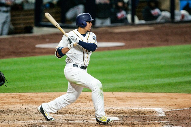 SAN DIEGO, CA - JUNE 06:  Jon Jay #24 of the San Diego Padres hits the ball in the eighth inning against the Atlanta Braves at PETCO Park on June 6, 2016 in San Diego, California.  (Photo by Kent Horner/Getty Images)