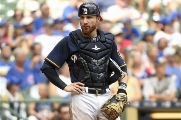 Milwaukee Brewers' Jonathan Lucroy waits between batters during the sixth inning of a baseball game against the Chicago Cubs Sunday, July 24, 2016, in Milwaukee. (AP Photo/Benny Sieu)