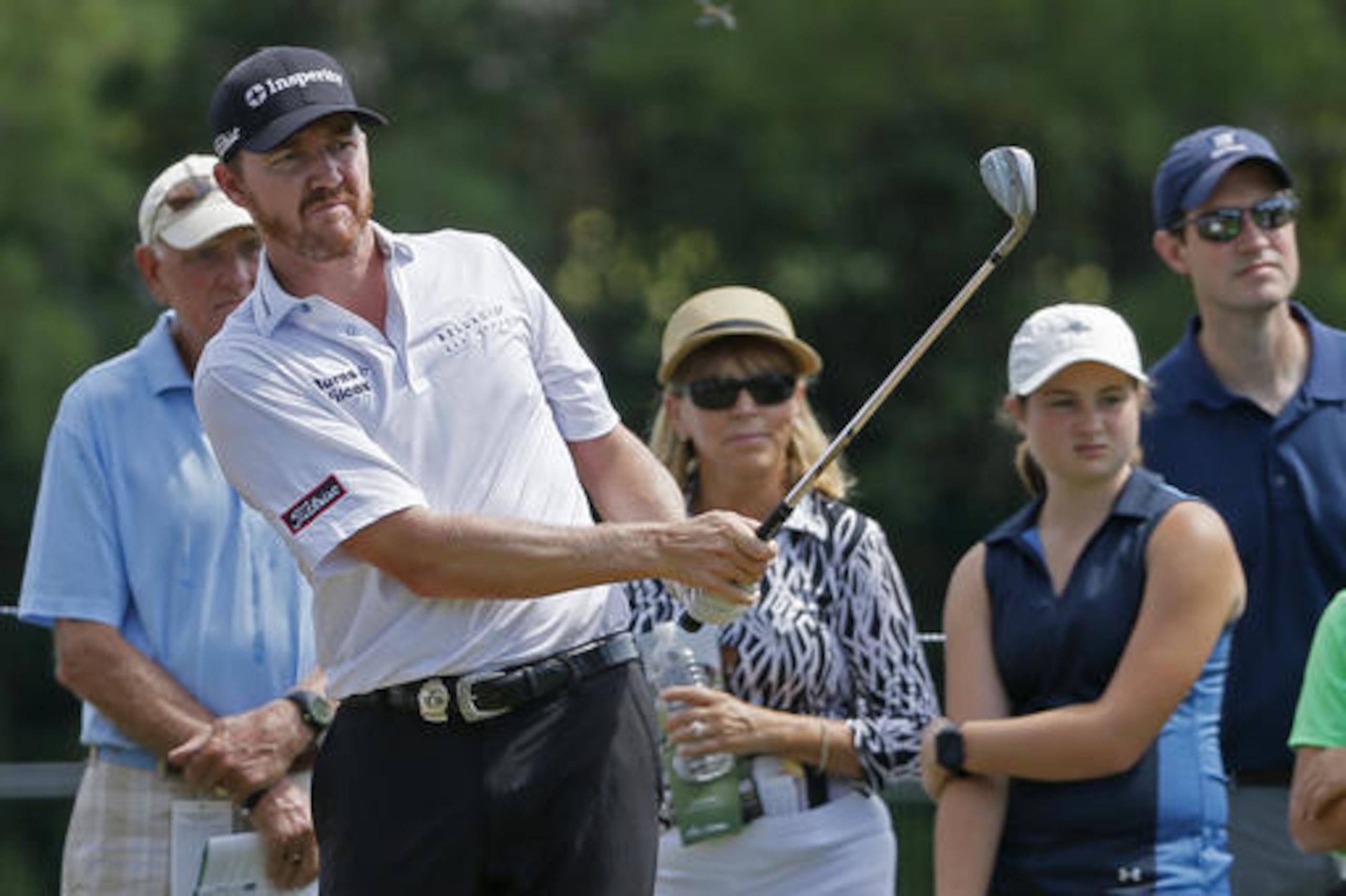 Jimmy Walker watches his chip shot to the third green during the first round of the PGA Championship golf tournament at Baltusrol Golf Club in Springfield, N.J., Thursday, July 28, 2016. (AP Photo/Tony Gutierrez)