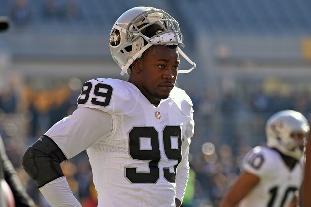 PITTSBURGH, PA - NOVEMBER 8:  Linebacker Aldon Smith #99 of the Oakland Raiders looks on from the field before a game against the Pittsburgh Steelers at Heinz Field on November 8, 2015 in Pittsburgh, Pennsylvania. The Steelers defeated the Raiders 38-35. (Photo by George Gojkovich/Getty Images)