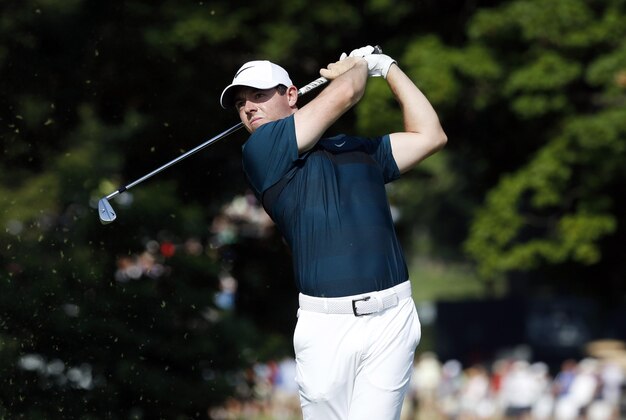 Jul 28, 2016; Springfield, NJ, USA; PGA golfer Rory McIlroy tees off on the 12th hole during the first round of the 2016 PGA Championship golf tournament at Baltusrol GC - Lower Course. Mandatory Credit: Brian Spurlock-USA TODAY Sports