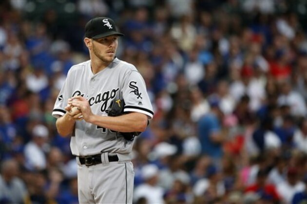 Chicago White Sox starting pitcher Chris Sale looks around Wrigley Field during the first inning of a baseball game against the Chicago Cubs Thursday, July 28, 2016, in Chicago. (AP Photo/Charles Rex Arbogast)