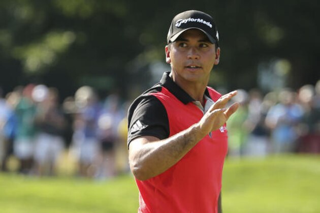 Jason Day waves to the crowd after a putt on the 10th hole during the second round of the PGA Championship golf tournament at Baltusrol Golf Club in Springfield, N.J., Friday, July 29, 2016. (AP Photo/Seth Wenig)
