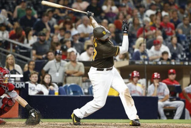 San Diego Padres' Matt Kemp strikes out on a pitch in the ninth inning against the Cincinnati Reds in a baseball game Friday, July 29, 2016, in San Diego. The Reds won 6-0 . (AP Photo/Lenny Ignelzi)