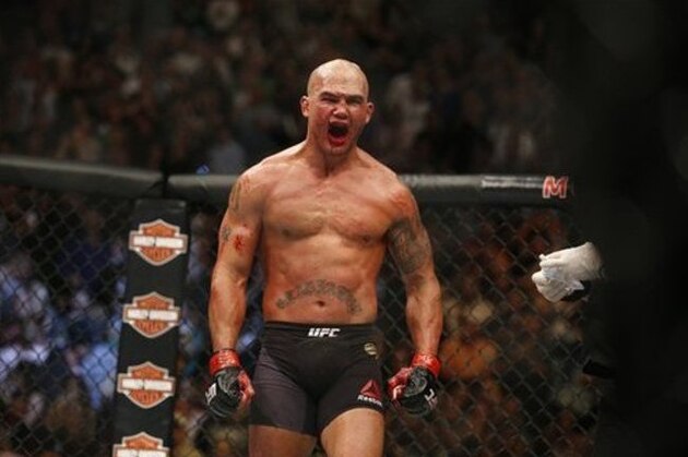 Robbie Lawler celebrates after defeating Rory MacDonald during their welterweight title fight mixed martial arts bout at UFC 189 Saturday, July 11, 2015, in Las Vegas. (AP Photo/John Locher)