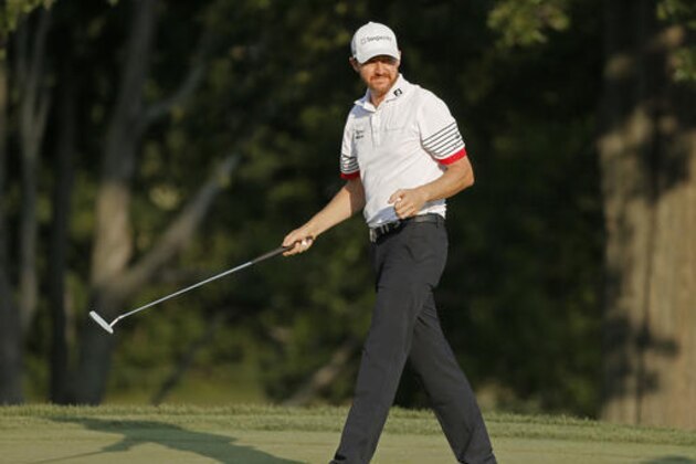 Jimmy Walker reacts to finishing on the 18th hole during the second round of the PGA Championship golf tournament at Baltusrol Golf Club in Springfield, N.J., Friday, July 29, 2016. (AP Photo/Tony Gutierrez)