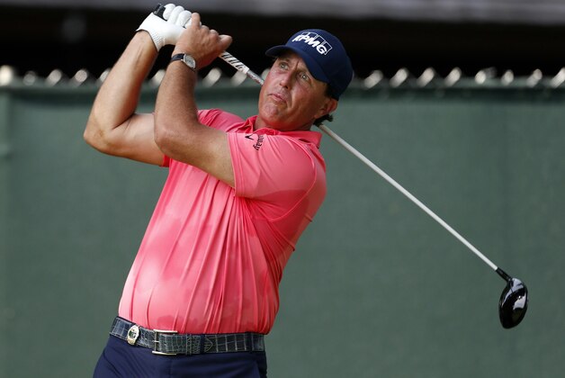 Jul 28, 2016; Springfield, NJ, USA; PGA golfer Phil Mickelson tees off on the 14th hole during the first round of the 2016 PGA Championship golf tournament at Baltusrol GC - Lower Course. Mandatory Credit: Brian Spurlock-USA TODAY Sports