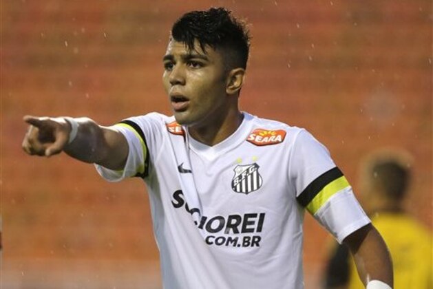 In this Jan. 21, 2014 photo, Santos' Gabriel Barbosa reacts during a Campeonato Paulista soccer game at Pacaembu stadium, in Sao Paulo, Brazil. Santos striker Gabriel Barbosa doesn’t like the comparison, but Brazilians see him as the next Neymar. How’s that for pressure? The 19-year-old Barbosa, who is known universally as “Gabigol,” is ranked as Brazil’s most promising player. (AP Photo/Nelson Antoine)