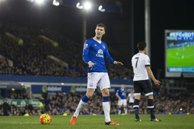 Everton's John Stones gestures to supporters during the English Premier League soccer match between Everton and Tottenham at Goodison Park Stadium, Liverpool, England, Sunday Jan. 3,  2016. (AP Photo/Jon Super)