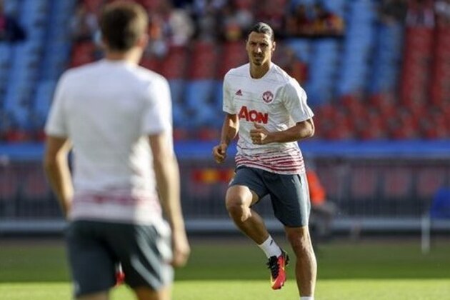 Manchester United's Zlatan Ibrahimovic warms up before their pre-season friendly soccer match against Galatasaray at Ullevi Stadium, Gothenburg, Sweden, Saturday, July 30, 2016. (Bjorn Larsson Rosvall/TT News Agency via AP)