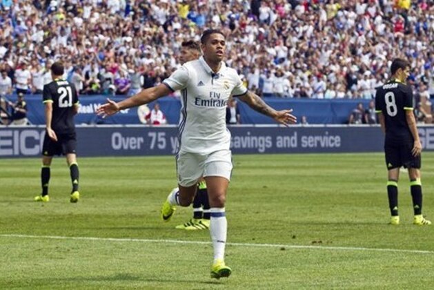 Real Madrid forward Mariano Diaz (37) celebrates his goal in the first half of an International Champions Cup soccer match against Chelsea, Saturday, July 30, 2016, in Ann Arbor, Mich. (AP Photo/Tony Ding)