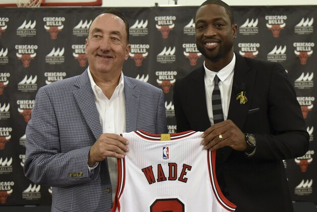 Jul 29, 2016; Chicago, IL, USA; Chicago Bulls guard Dwayne Wade (right) and Bulls general manager Gar Forman pose for a photo after addressing the media after a press conference at Advocate Center. Mandatory Credit: David Banks-USA TODAY Sports