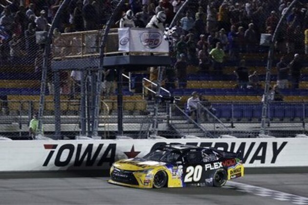 Erik Jones crosses the finish line as he wins the NASCAR Xfinity Series auto race, Saturday, July 30, 2016, at Iowa Speedway in Newton, Iowa. (AP Photo/Charlie Neibergall)