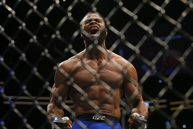 Jul 30, 2016; Atlanta, GA, USA; Tyron Woodley reacts after knocking out Robbie Lawler (not shown) in the first round for the world welterweight championship during UFC 201 at Phillips Arena. Mandatory Credit: Butch Dill-USA TODAY Sports