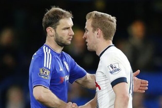 Chelsea's Branislav Ivanovic, left, shakes hands withTottenham's Harry Kane after the English Premier League soccer match between Chelsea and Tottenham Hotspur at Stamford Bridge stadium in London, Monday, May 2, 2016. (AP Photo/Frank Augstein)