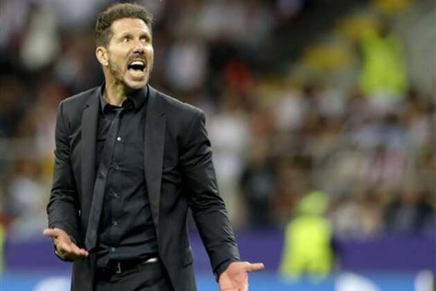 Atletico's coach Diego Simeone reacts during the Champions League final soccer match between Real Madrid and Atletico Madrid at the San Siro stadium in Milan, Italy, Saturday, May 28, 2016.  (AP Photo/Luca Bruno)