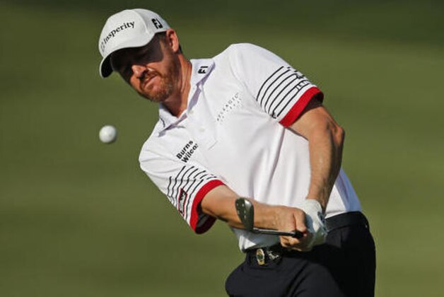 Jimmy Walker chips to the 15th green during the second round of the PGA Championship golf tournament at Baltusrol Golf Club in Springfield, N.J., Friday, July 29, 2016. (AP Photo/Mike Groll)