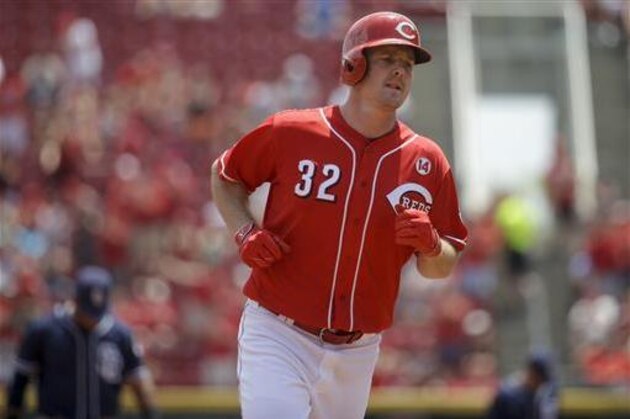 Cincinnati Reds' Jay Bruce runs the bases after hitting a solo home run off San Diego Padres relief pitcher Luis Perdomo in the fourth inning of a baseball game, Sunday, June 26, 2016, in Cincinnati. (AP Photo/John Minchillo)