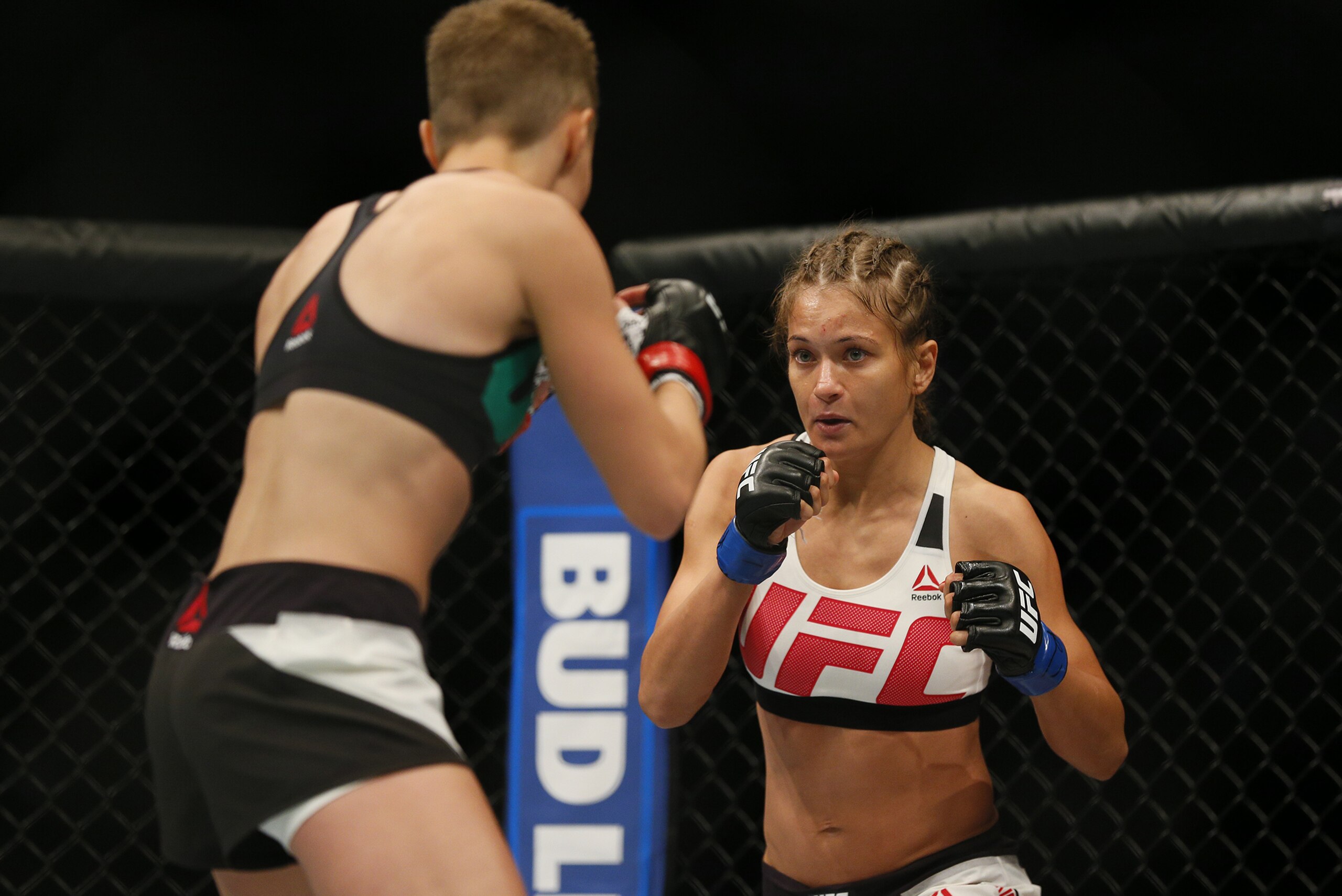 Jul 30, 2016; Atlanta, GA, USA; Rose Namajunas (red gloves) competes against Karolina Kowaliewicz (blue gloves) during UFC 201 at Phillips Arena. Mandatory Credit: Butch Dill-USA TODAY Sports
