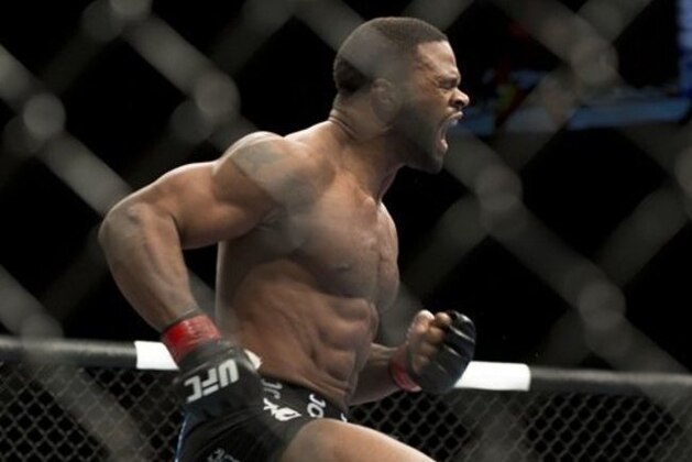 Tyron Woodley his first round KO victory over Jay Hieron during their UFC 156 welterweight mixed martial arts match, Saturday, Feb. 2, 2013 at The Mandalay Bay Resort & Casino in Las Vegas. (AP Photo/Eric Jamison) Tyron Woodley his first round KO victory over Jay Hieron during their UFC 156 welterweight mixed martial arts match, Saturday, Feb. 2, 2013 at The Mandalay Bay Resort & Casino in Las Vegas. (AP Photo/Eric Jamison)