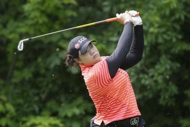 Ariya Jutanugarn, of Thailand, hits from the seventh tee during the third round of the LPGA Volvik Championship golf tournament at the Travis Pointe Country Club, Saturday, May 28, 2016, in Ann Arbor, Mich. (AP Photo/Carlos Osorio)