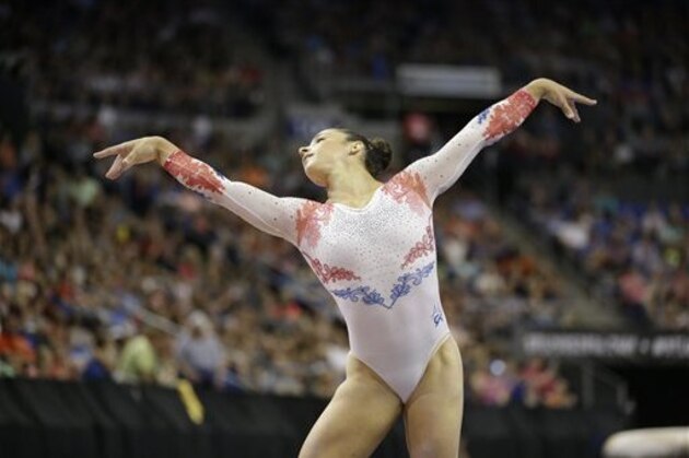 Aly Raisman competes in the floor exercise during the U.S. women's gymnastics championships Sunday, June 26, 2016, in St. Louis. (AP Photo/Jeff Roberson)